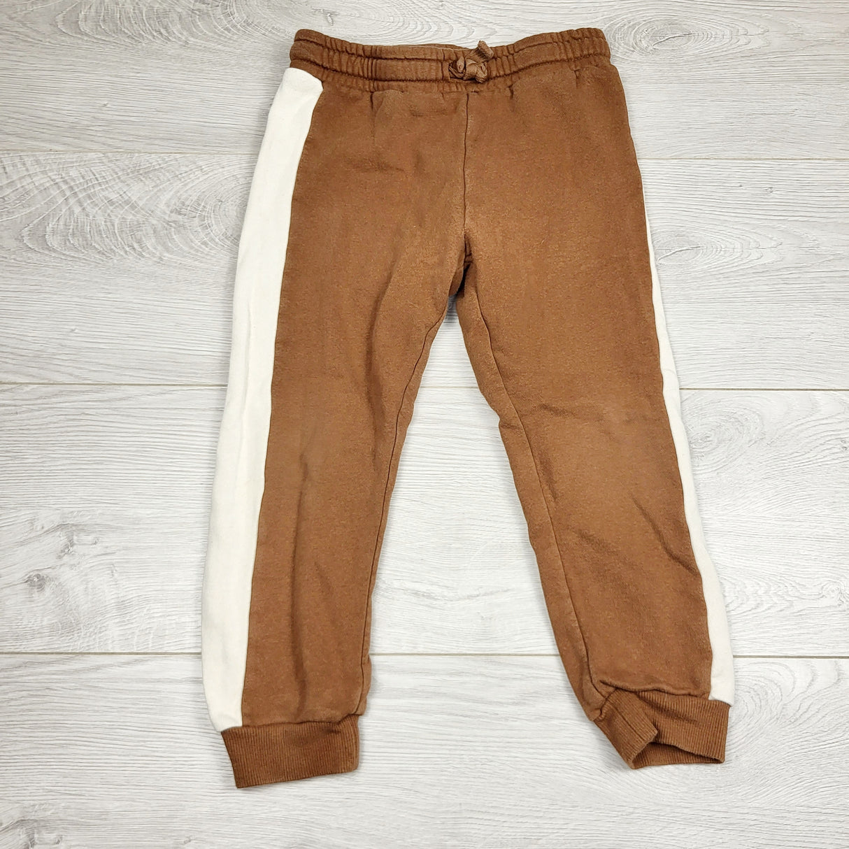 RMAZ22 - H and M tan fleecy lined joggers with side strip. Size 3/4T