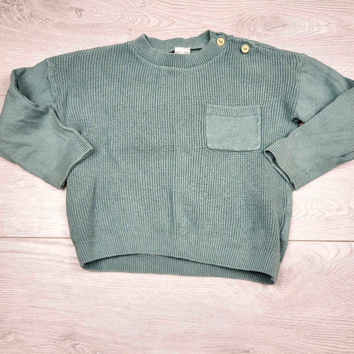 SPRCH1 - H and M aqua coloured waffle knit top. Size 12-18 months