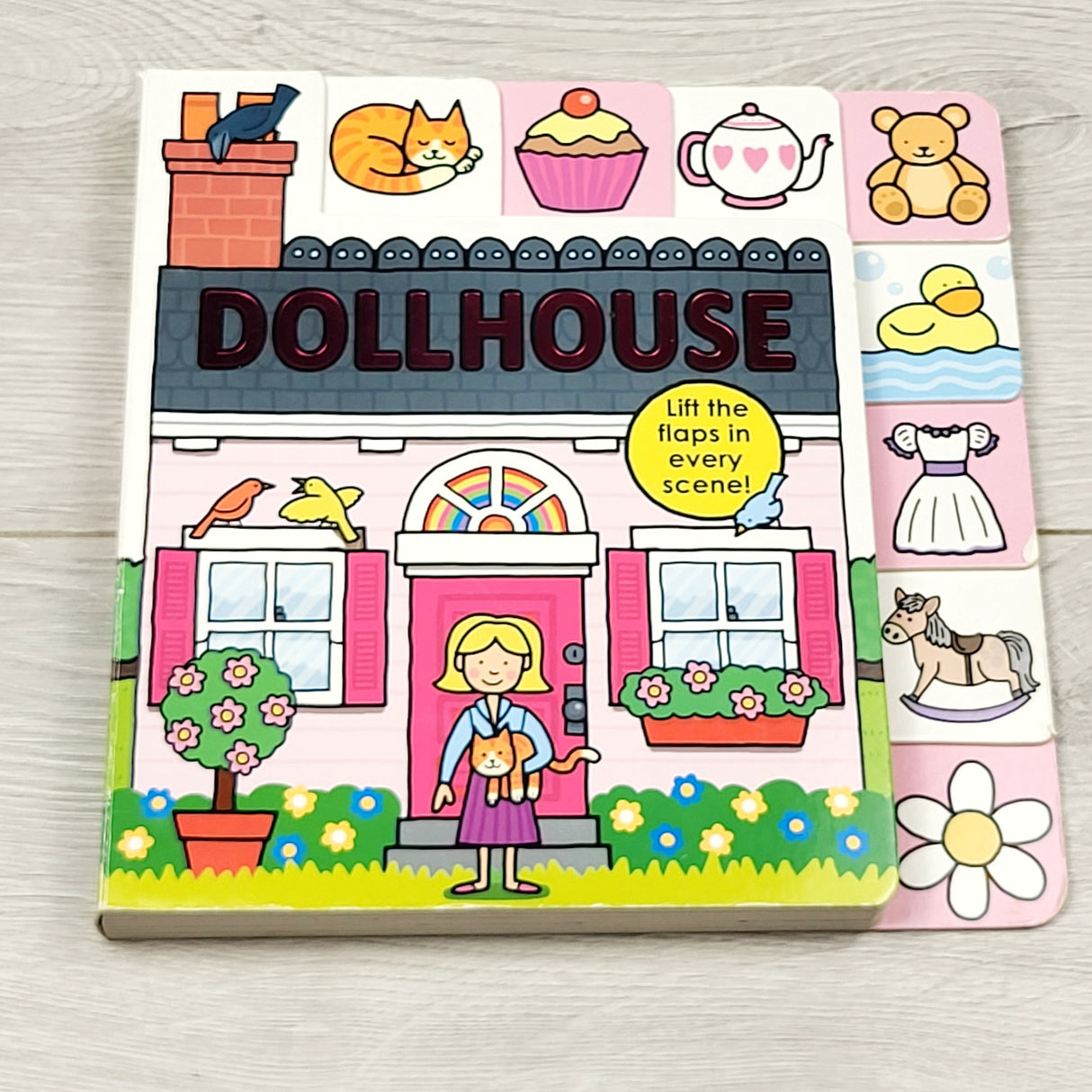 MHAN4 - Dollhouse. Lift the flap board book.