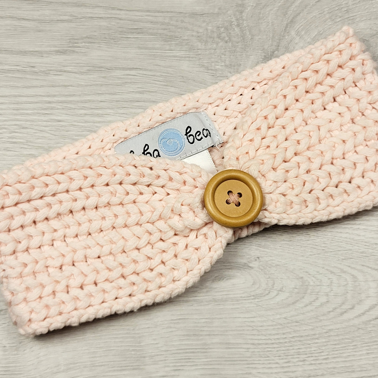 RMAZ3 - Beba Bean pink knit headband. 6-12 Months