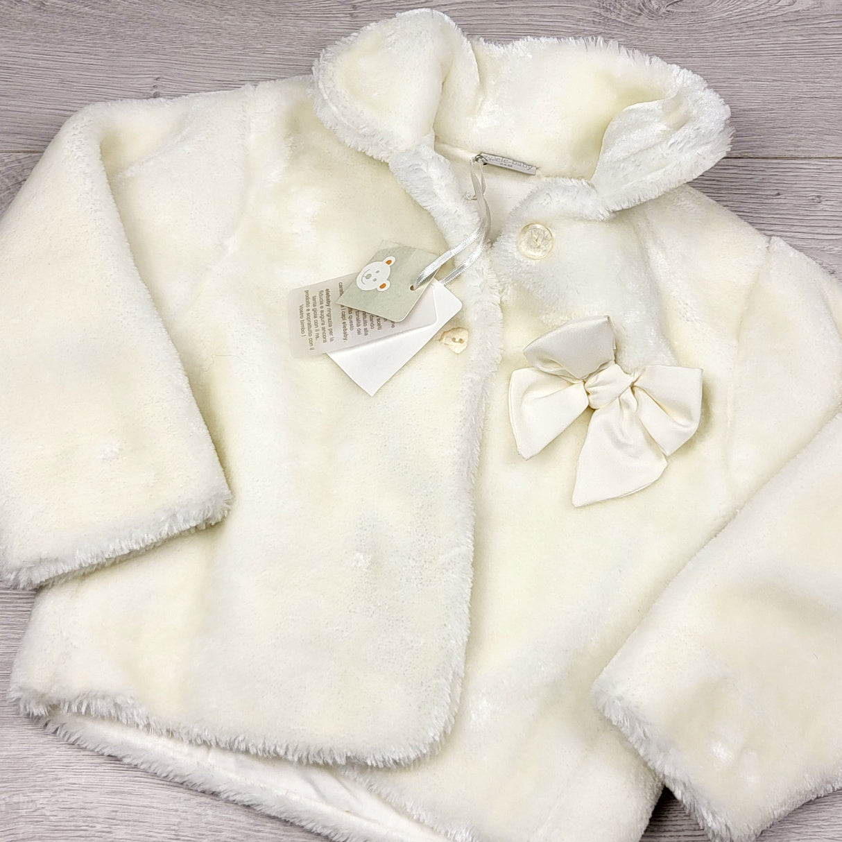 RMAZ3 - NEW - Ele-Baby white faux fur coat. Size 24 months