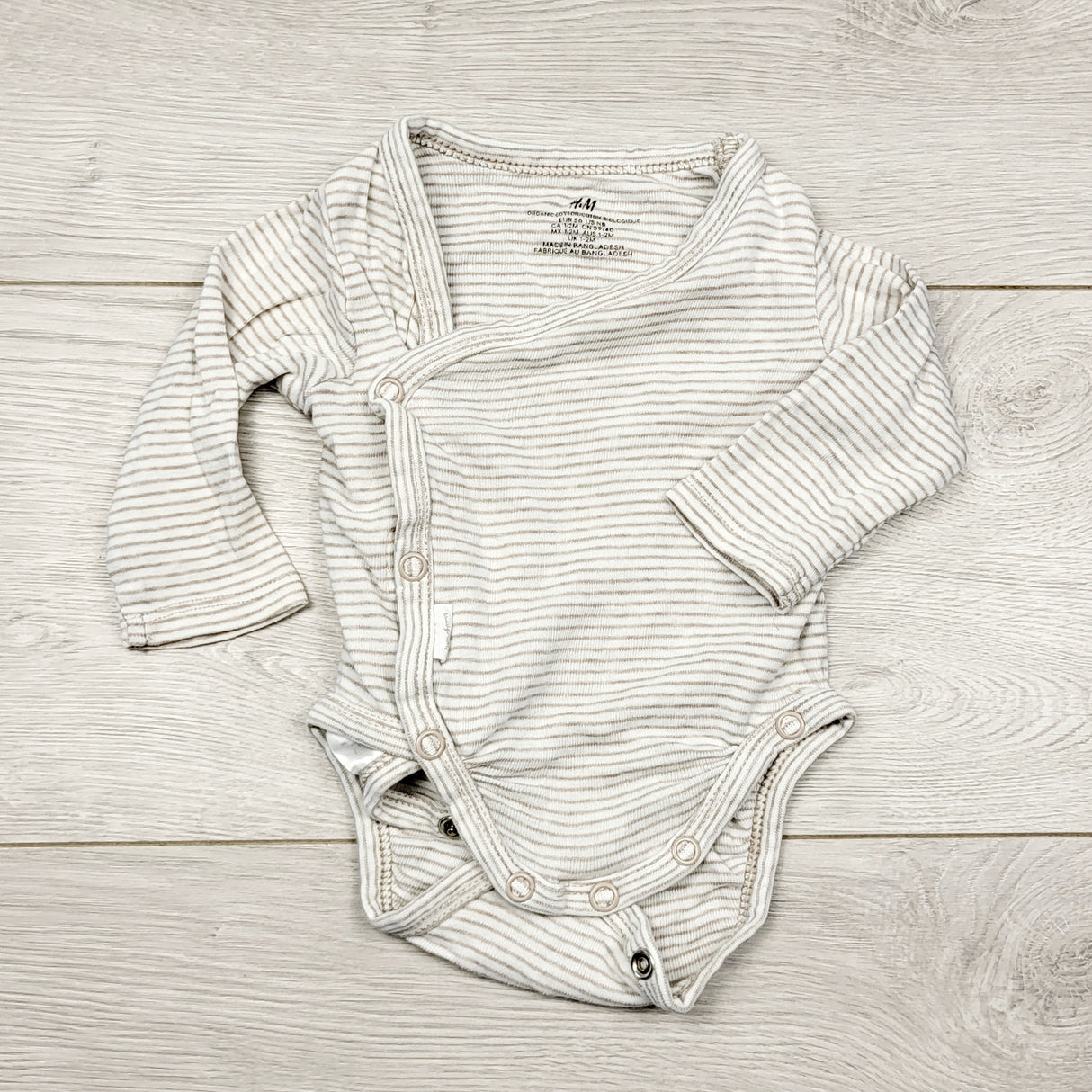 ECRS3 - H and M white and grey striped organic cotton wrap style bodysuit. Size 1-2 months