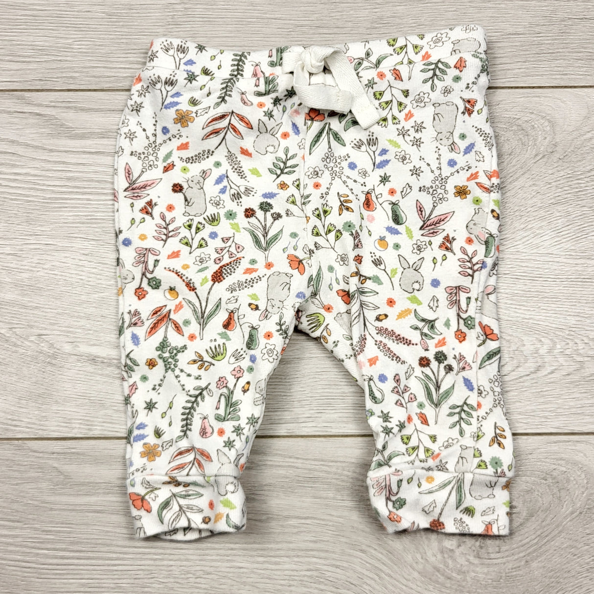 ECRS33 - Old Navy white floral print cotton pants with bunnies. Size 0-3 months