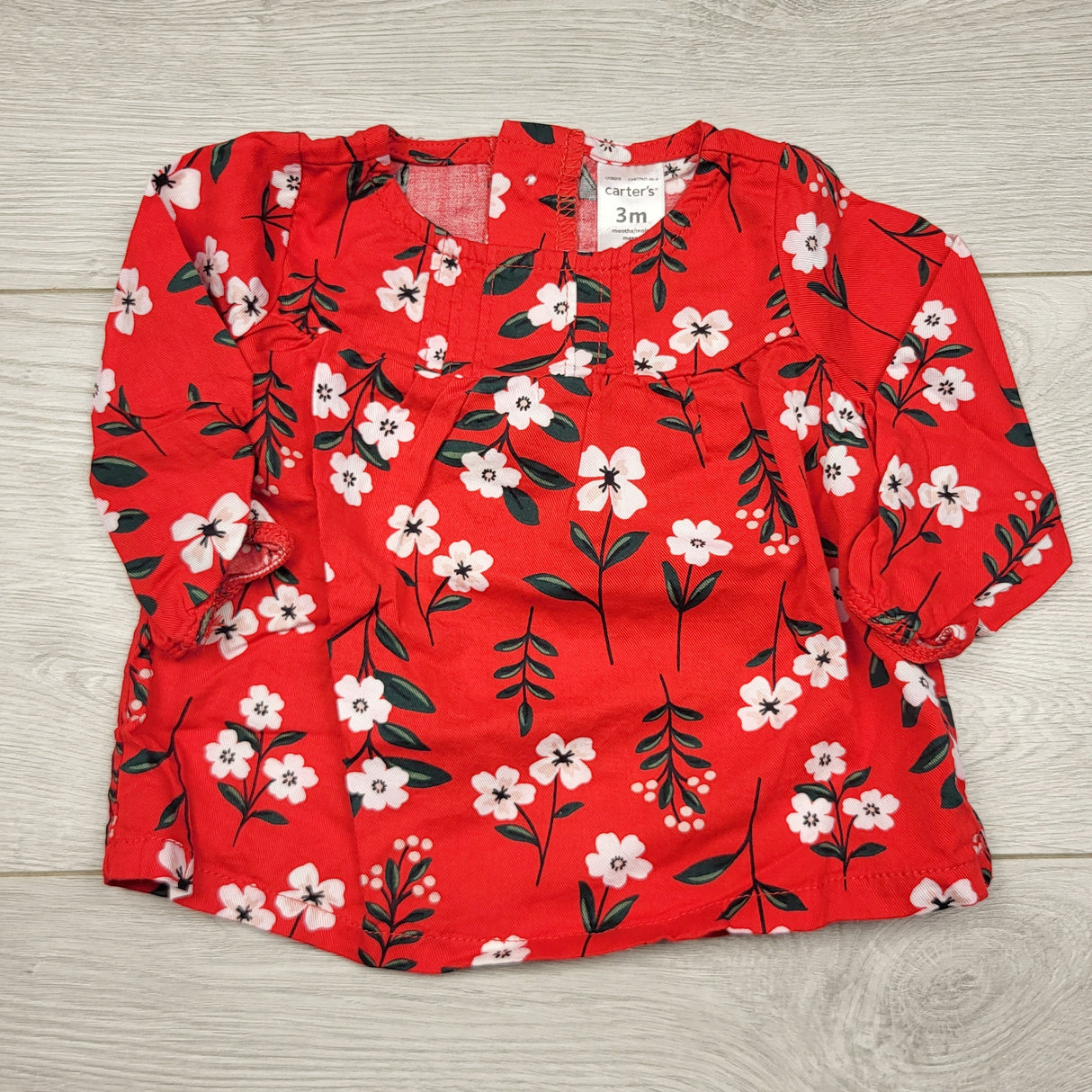 ECRS31 - Carters red floral print long sleeved top. Size 3 months