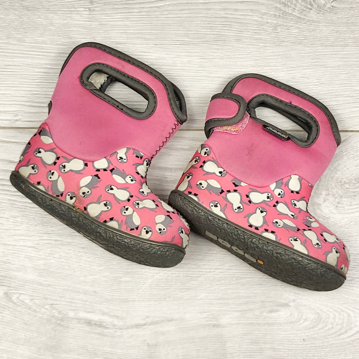 SPRCH2 - Bogs pink neoprene rain boots with penguins. Size 4