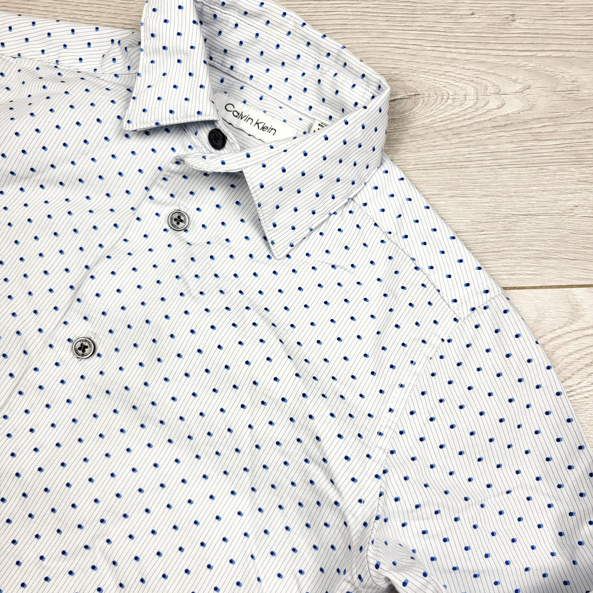 DPAR3 - Calvin Klein white polka dot button down shirt. Size 8