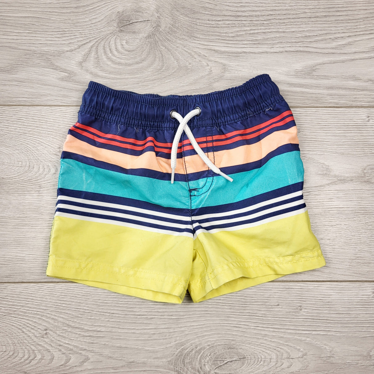 LMAC1 - Carters striped swim shorts. Size 6 months