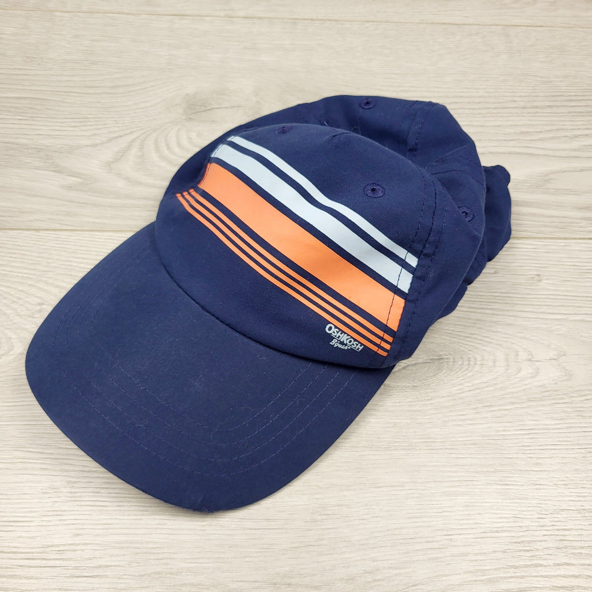 RBRSN2 - Oshkosh navy cap with velcro closure. Size 4 to 7 Years