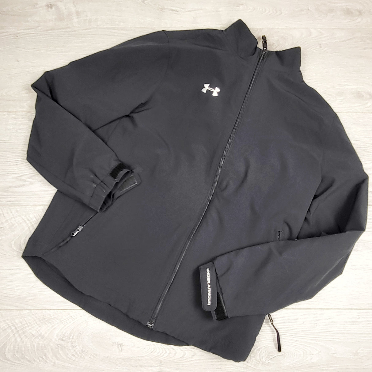 RMAC2 - Under Armour black loose fit Hockey Warm-Up Jacket. Size large (14/16)