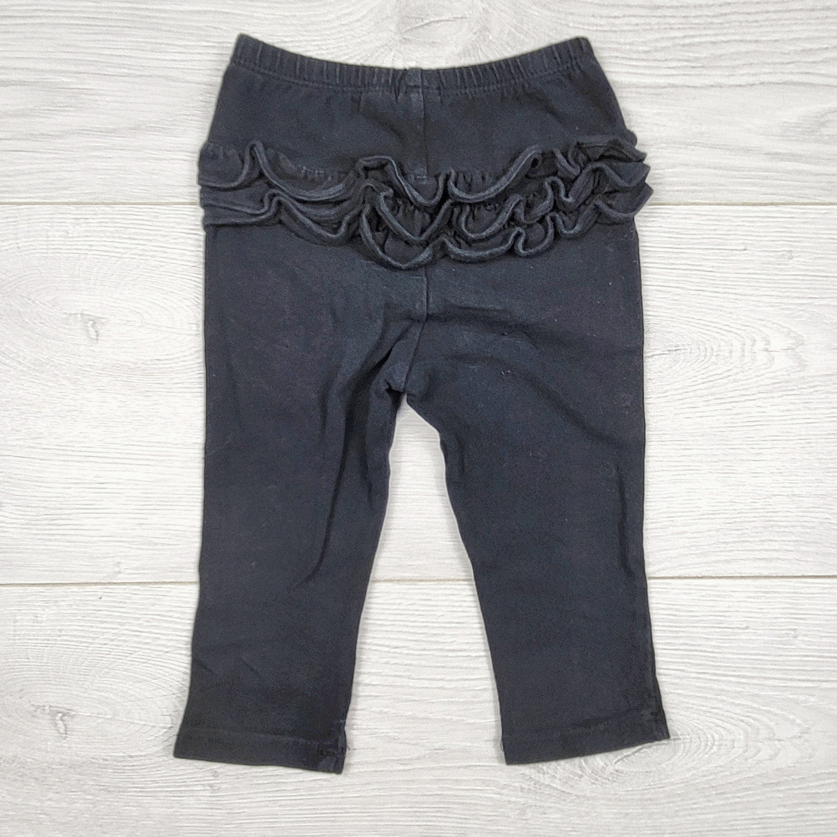 ECRS4 - Old Navy black cotton leggings with ruffle bum. Size 12-18 months