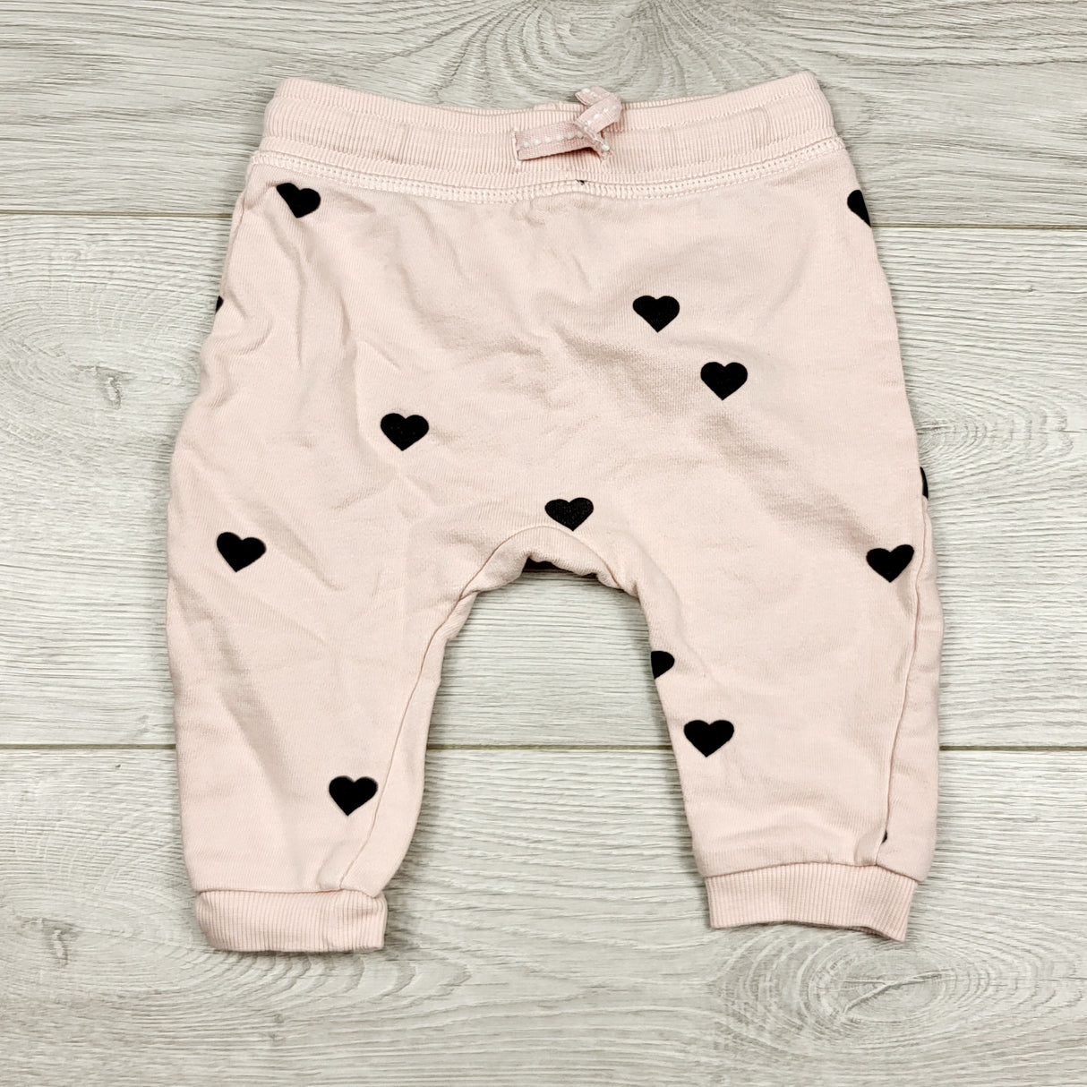 ECRS4- H and M pink cotton pants with hearts. Size 2-4 months