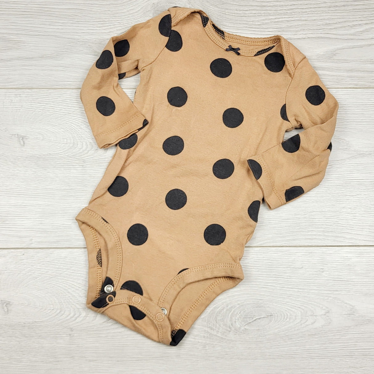 ECRS4 - Carters tan polka dot long sleeved bodysuit. Size 6 months