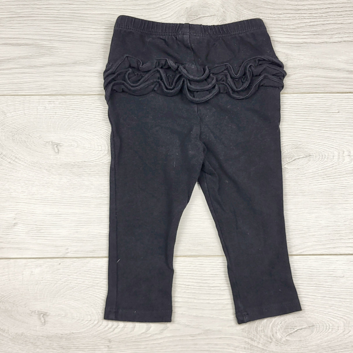 ECRS4 - Old Navy black leggings with ruffle bum. Size 6-12 months