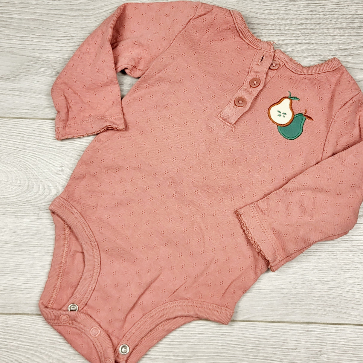 ECRS44 - Carters pink long sleeved bodysuit with pears. Size 6 months