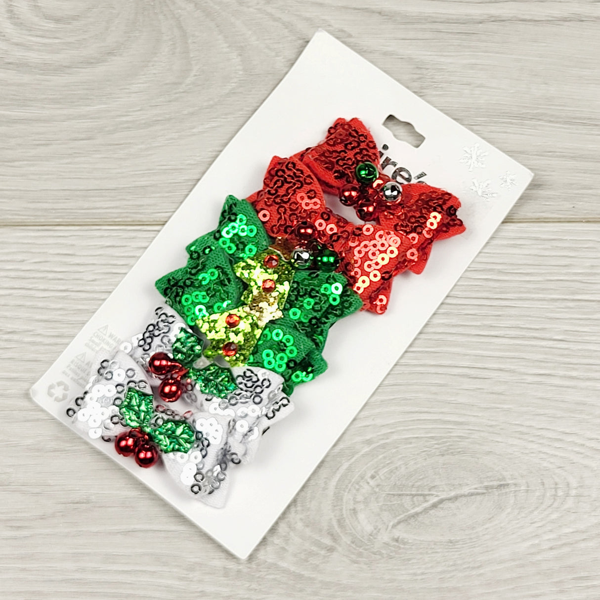 CKFT1 - NEW - Claire's 6-pack of holiday themed bow hair clips.