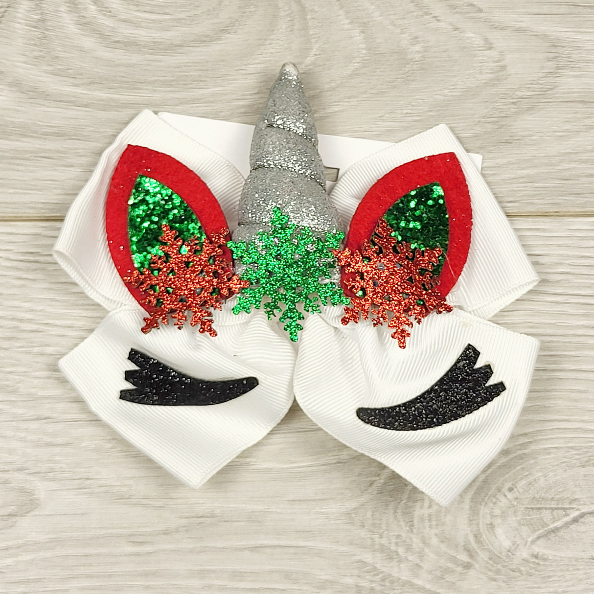 CKFT1 - NEW - Claire's holiday unicorn bow hair clip