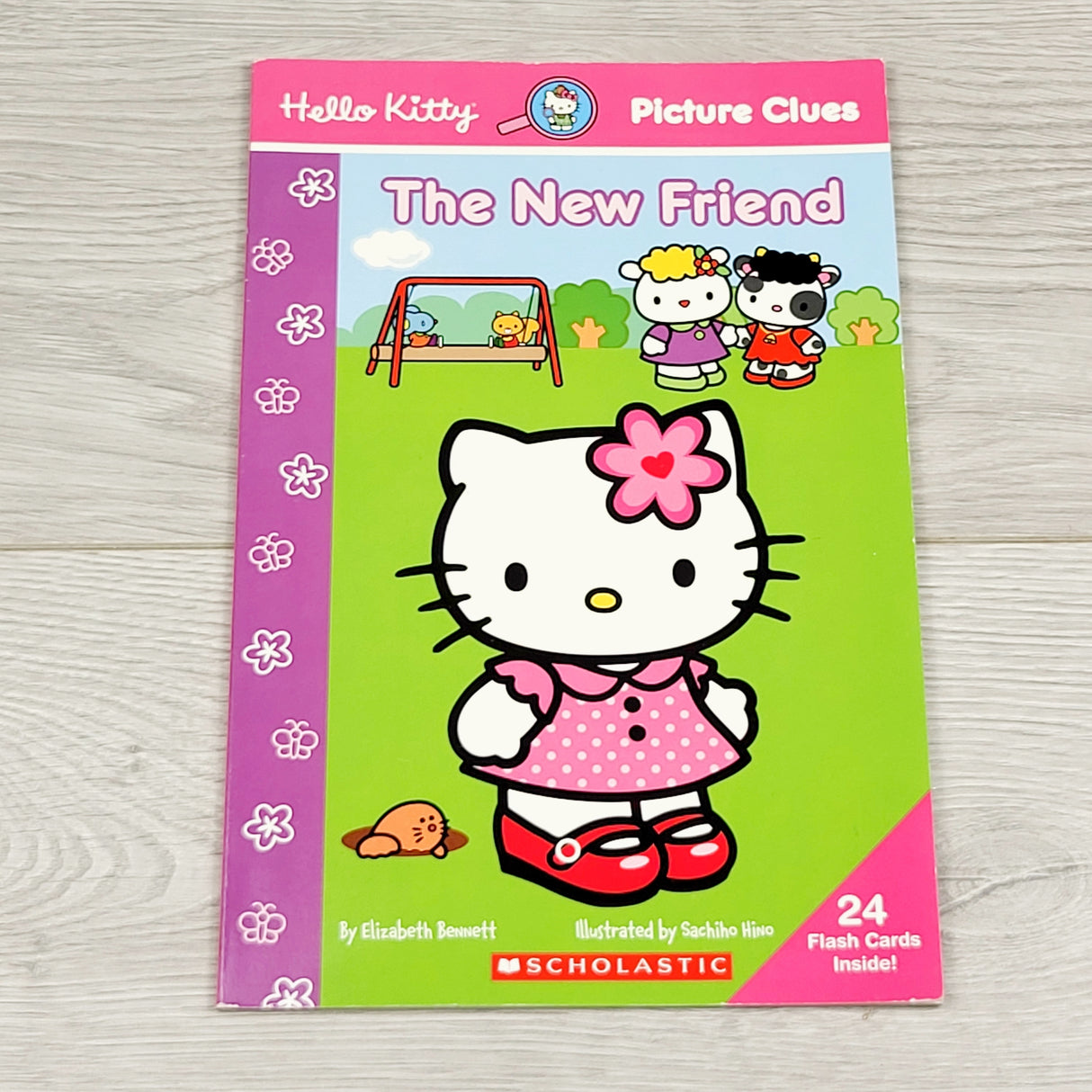 CKFT1 - The New Friend. Soft cover Hello Kitty picture clue book