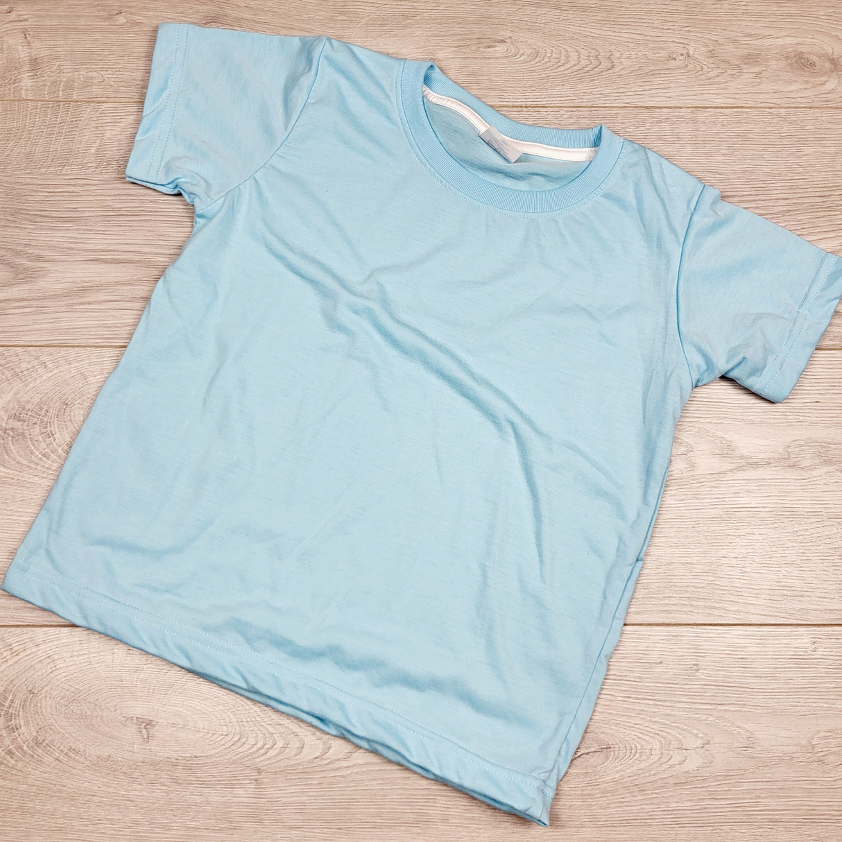 CKFT1 - Blanks Blanks Baby blue t-shirt. Size 5T