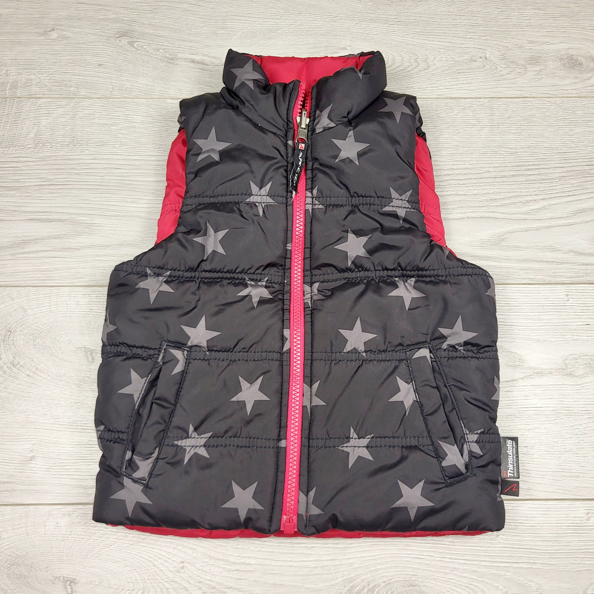 BVRN1 - Alpine Tek black puffer vest with stars. Size 2T