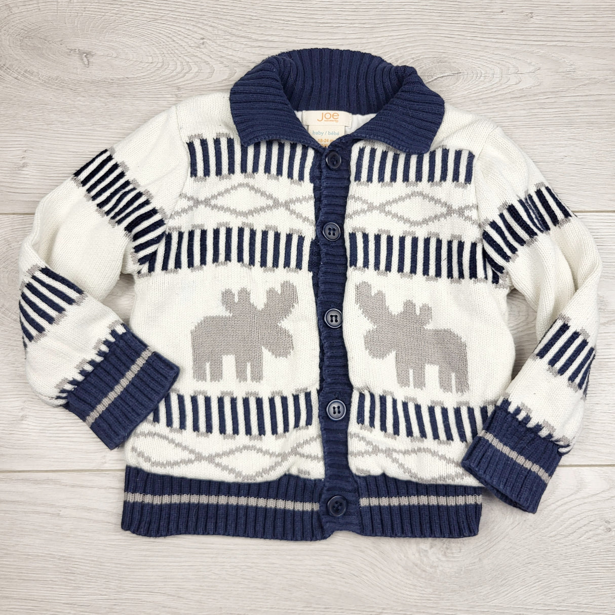 JMCL1 - Joe white and navy sweater coat with moose. Size 18-24 months