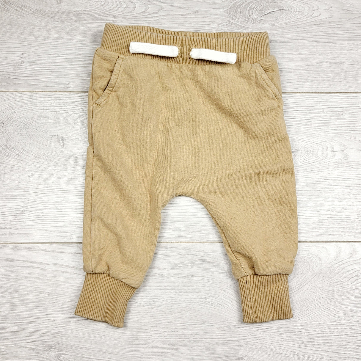 LMAC2 - Rise Little Earthling tan cotton pants. Size 6-9 months