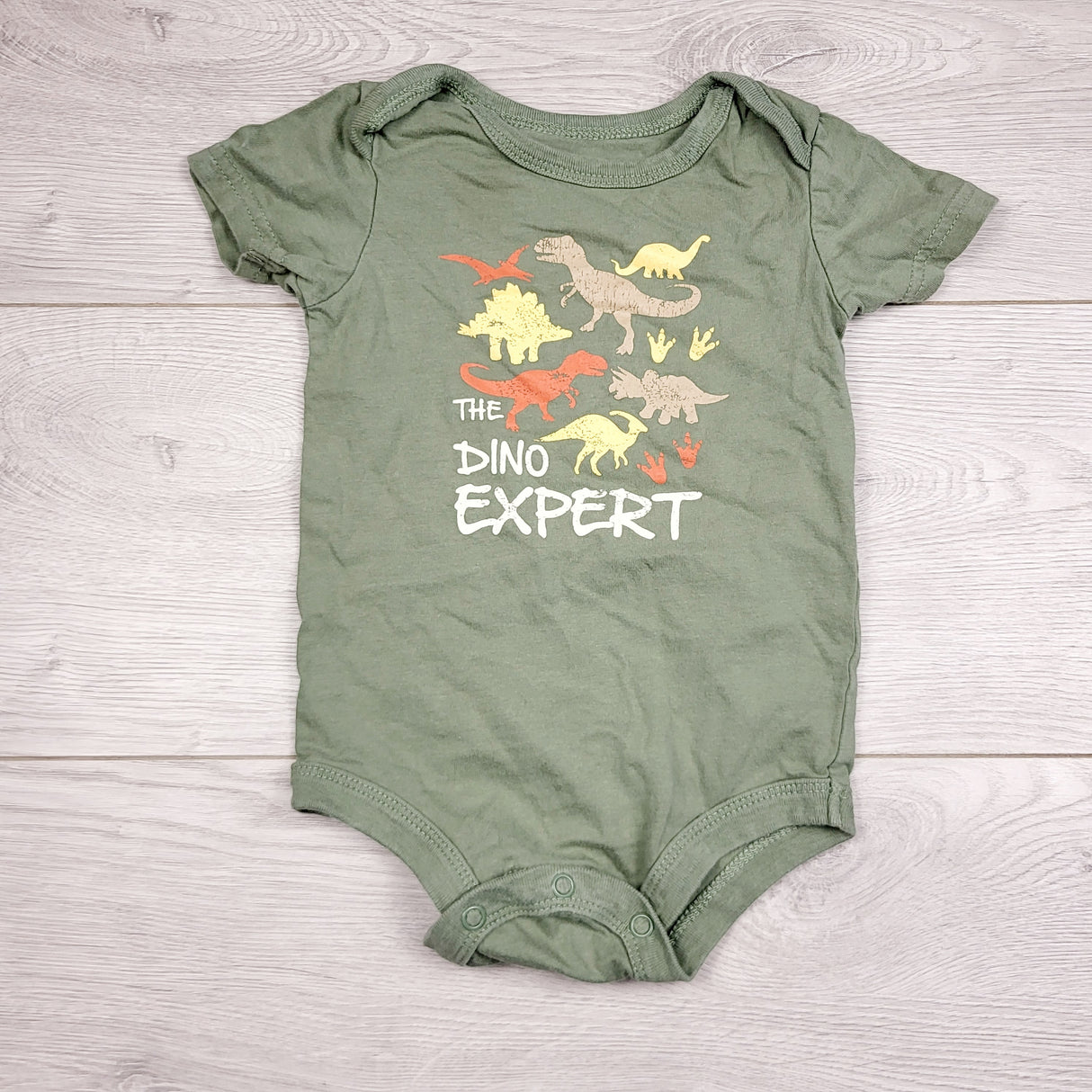 LMAC2 - George green dinosaur bodysuit. Size 6-12 months