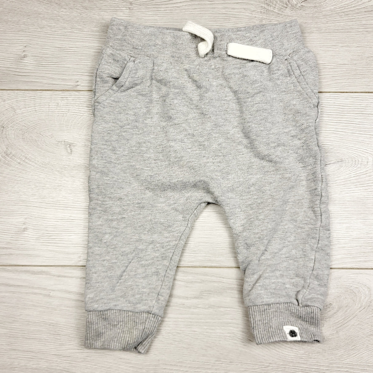 LMAC22 - Rise Little Earthling grey cotton pants. Size 6-9 months