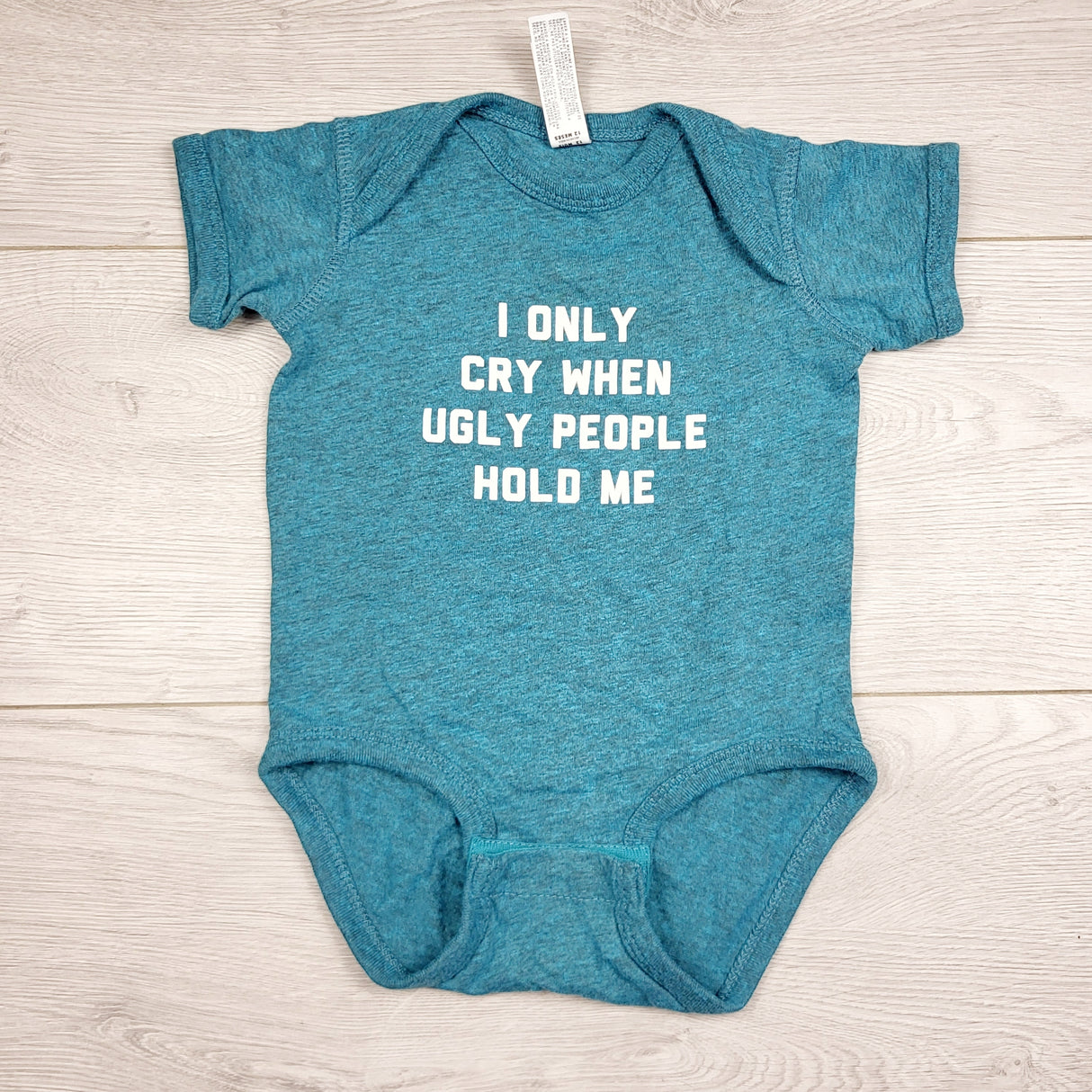 LMAC22 - Custom made teal "I Only Cry when Ugly People Hold Me" bodysuit. Size 12 months