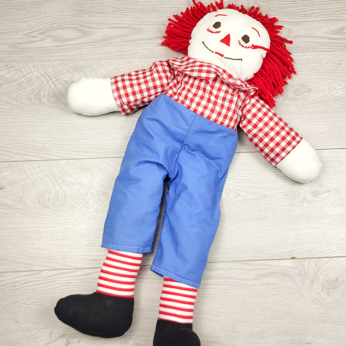 CBT1 - Handmade Raggedy Ann doll.  Marks on face