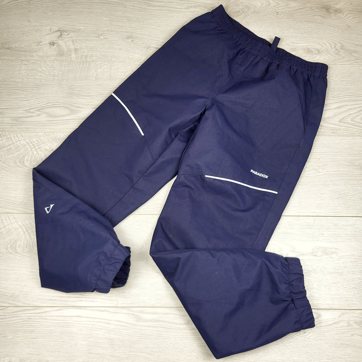 CKFT2 - Paradox navy rain pants. Size 14/16