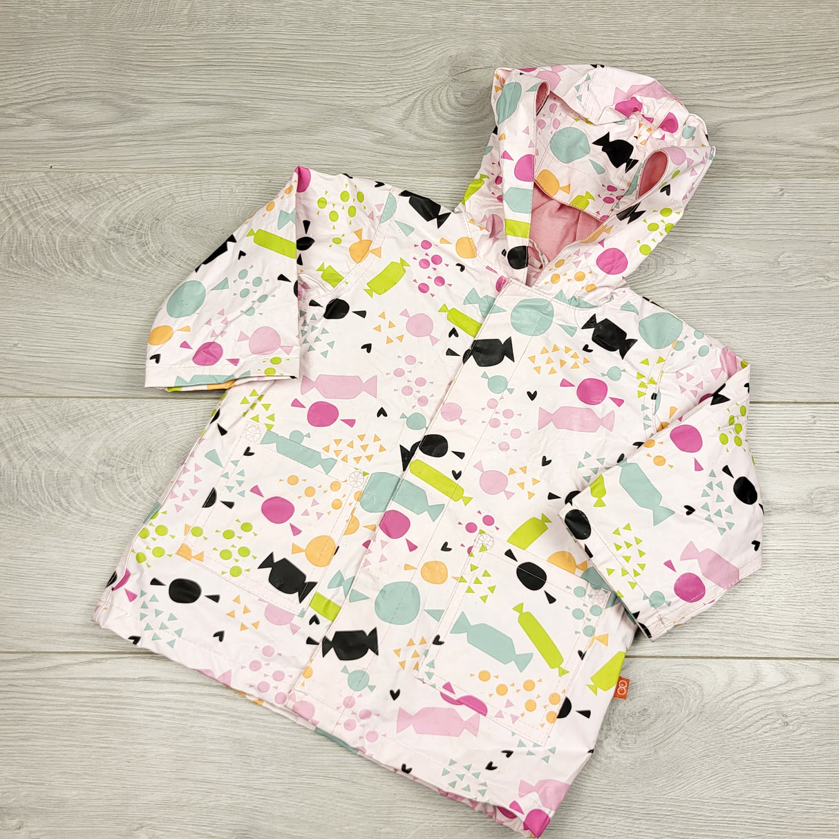 BVRN33 - Magnificent Baby candy print rain coat with magnetic close buttons. Size 12 months