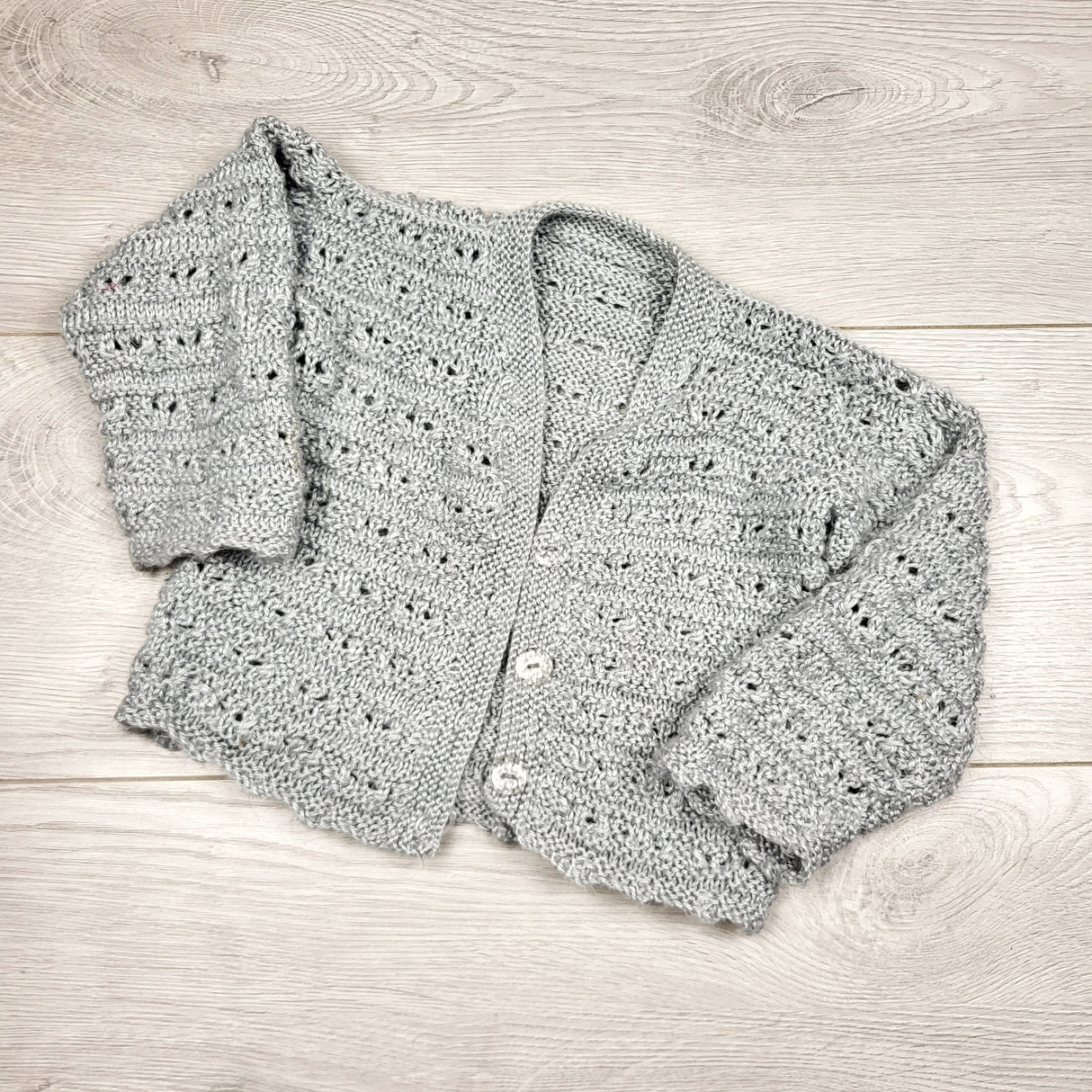 BVRN33  - Grey handmade cardigan sweater. Approx 12 months