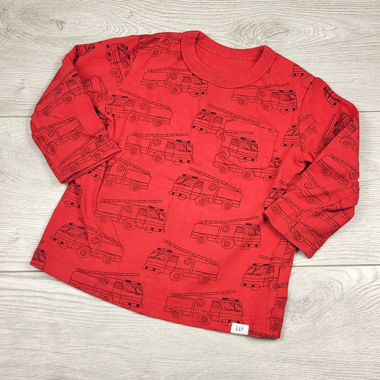 RUBH1 - Gap red long sleeved top with fire trucks. Size 12-18 months