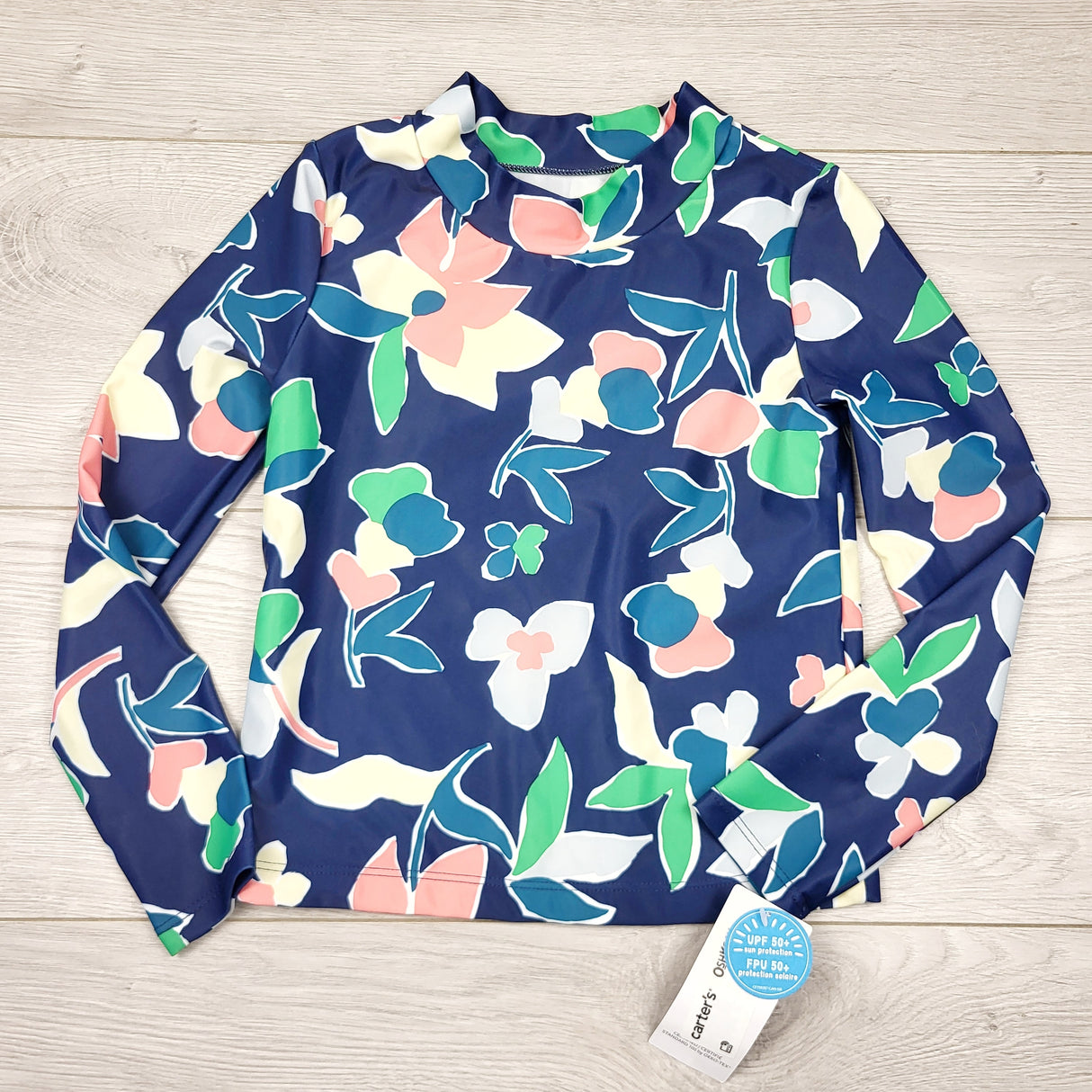 JDUN1 - NEW - Carters navy floral print long sleeved rash guard. Size 6/6X