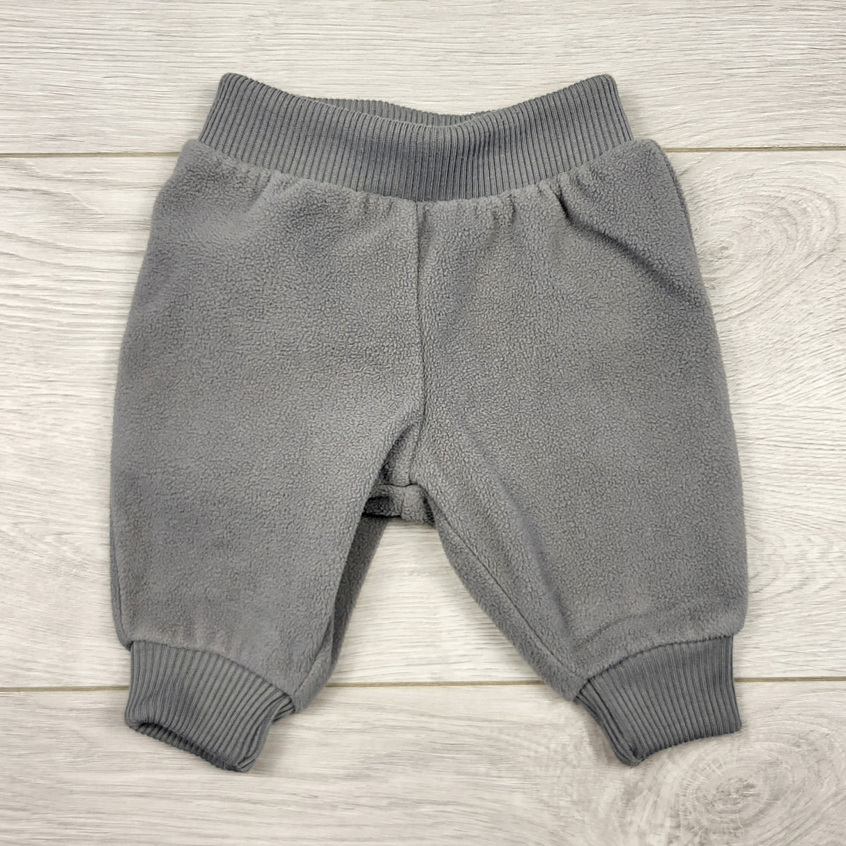 STFT22 - Simple Joys grey fleece pants. Newborn size