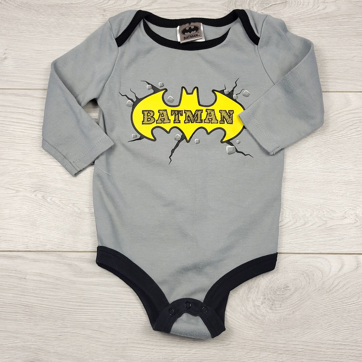 STFT22 - Grey Batman bodysuit. Size 3-6 months