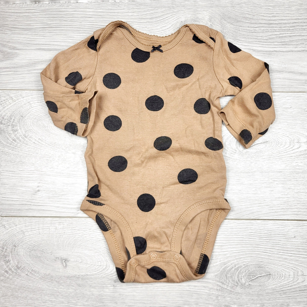 BVRN44 - Carters tan polka dot bodysuit. Size 6 months