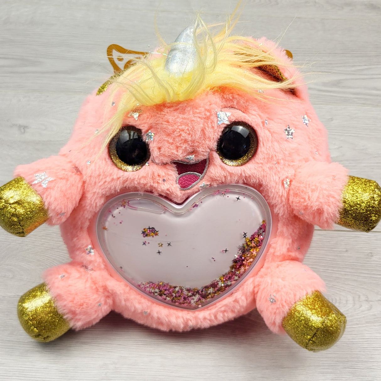 JKZ2 - Zuru Rainbocorns Wild Heart Surprise plush with water and star filled tummy