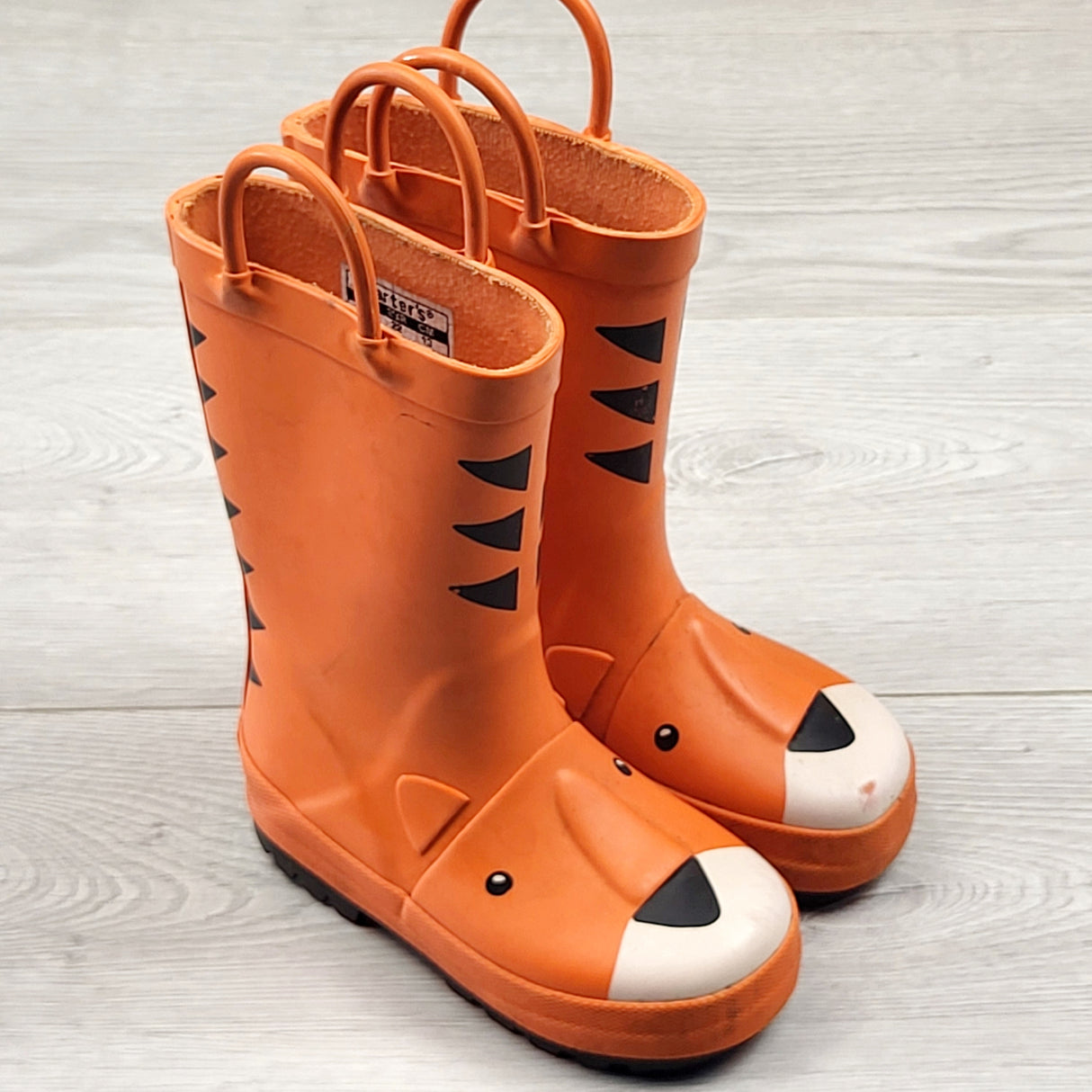 TCAD1 - Carters orange tiger rain boots. Size 6