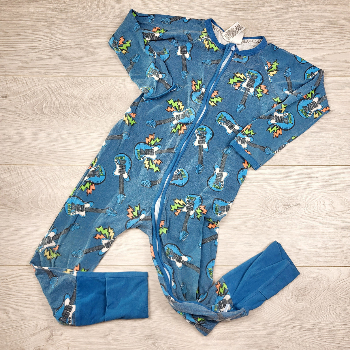 TCAD1 - Bonds teal wondersuit with guitars. Size 3T