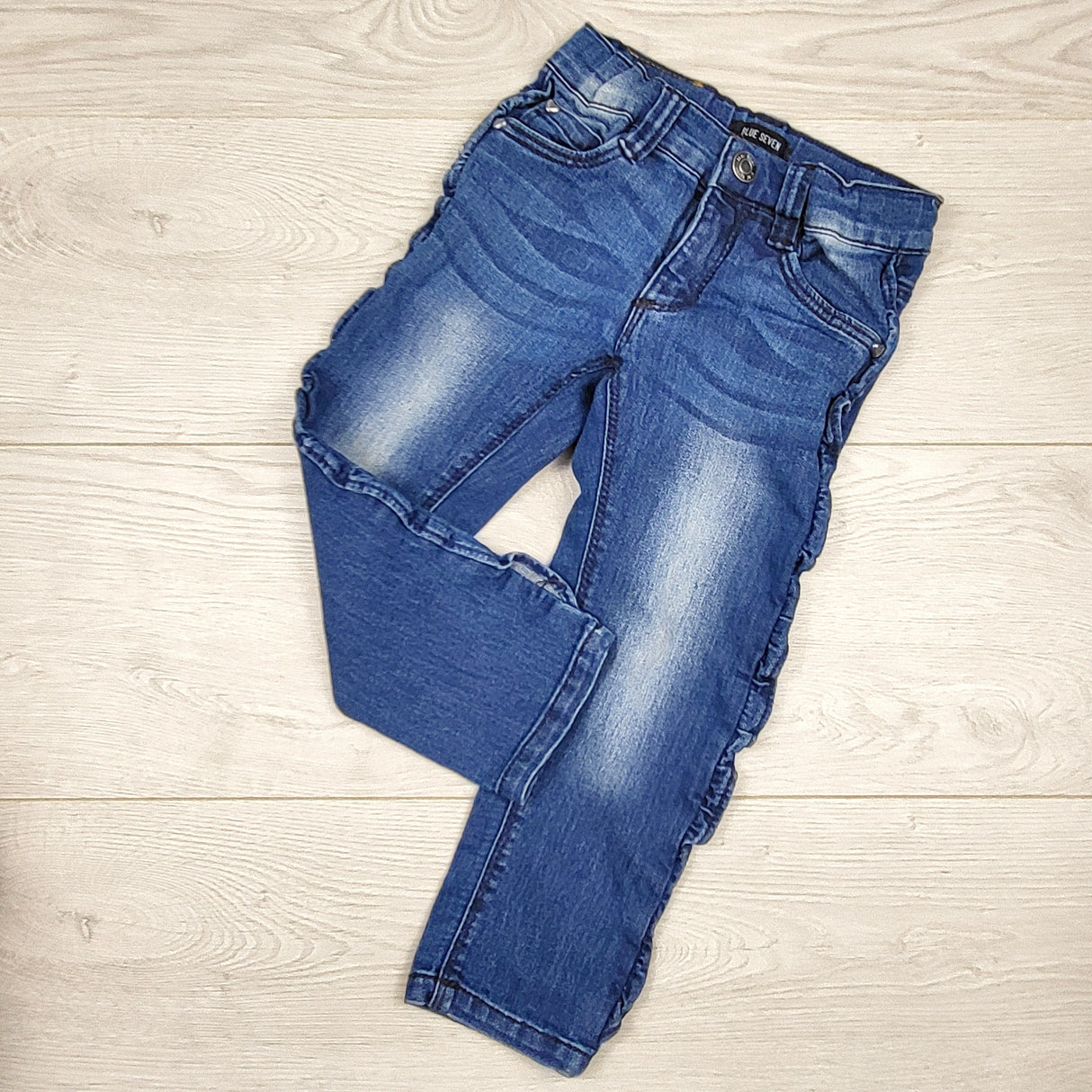 KJHN1 - Blue Seven distressed jeans with side ruffles. Size 2T