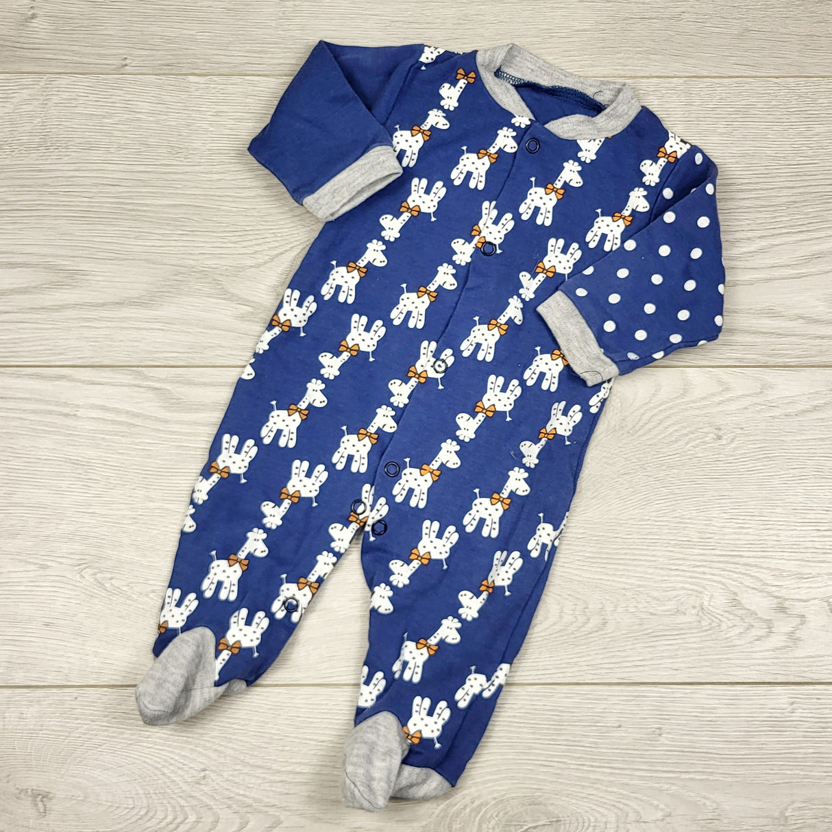 THNG11 - Baby One blue cotton sleeper with giraffes. Sizes like 0-3 months