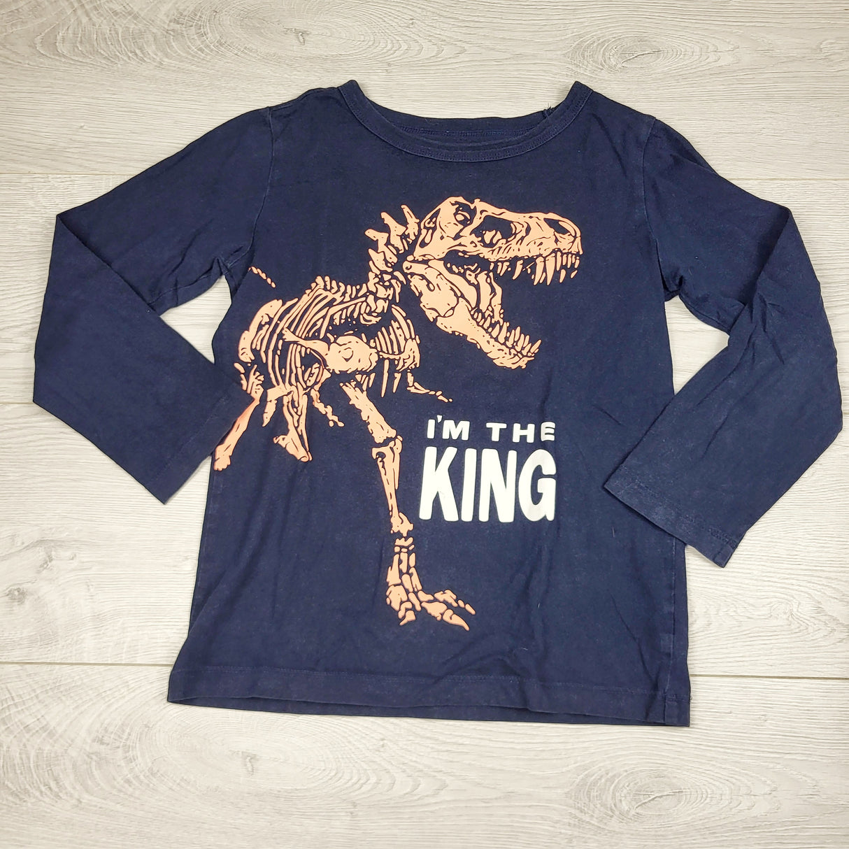 ATER1- Oshkosh navy t-shirt with dinosaur. Size 7