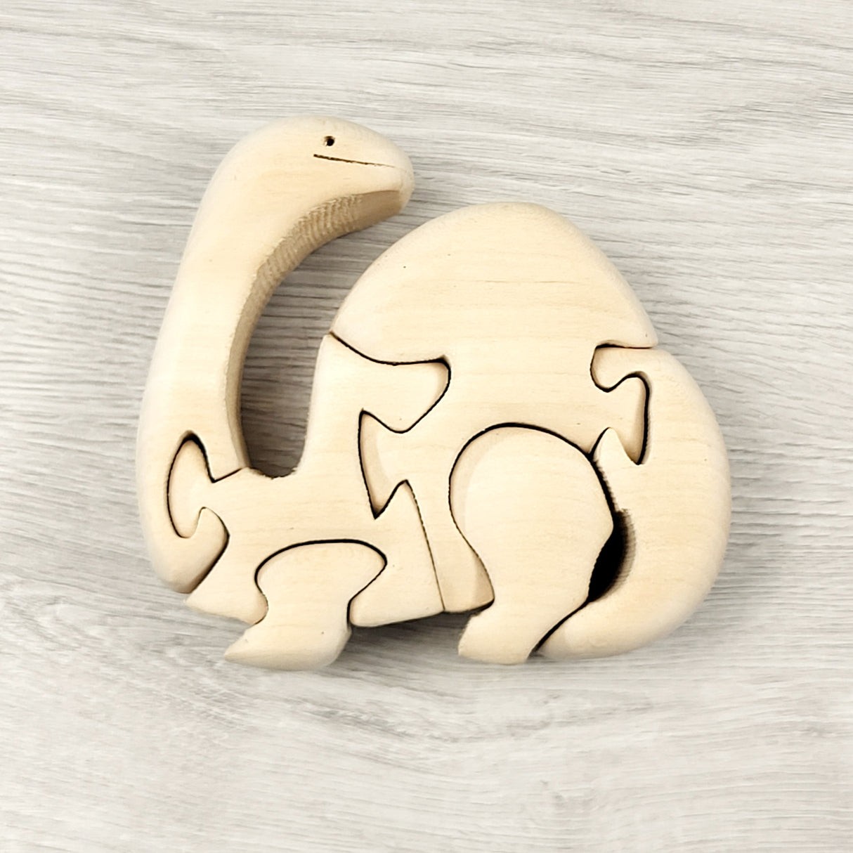 JLSN2 - Wooden dinosaur puzzle