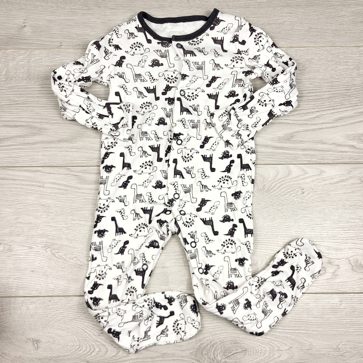 JLSN2 - George white and grey cotton sleeper with dinosaurs. Size 6-9 months