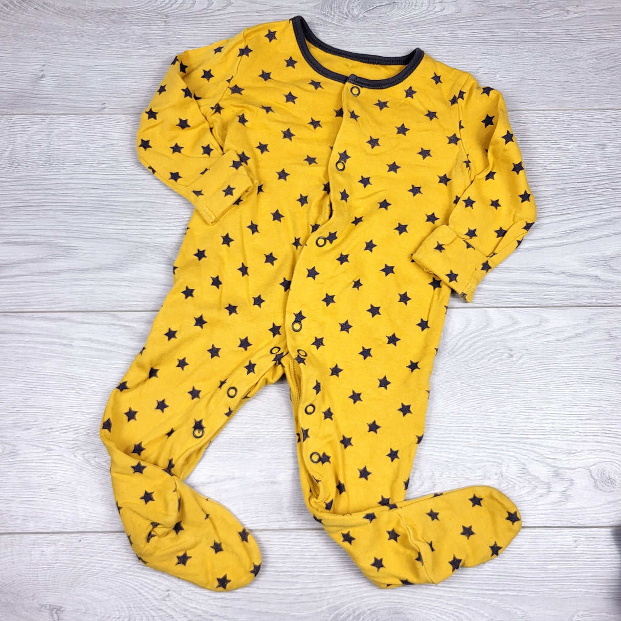 JLSN2 - George yellow cotton sleeper with stars. Size 6-9 months