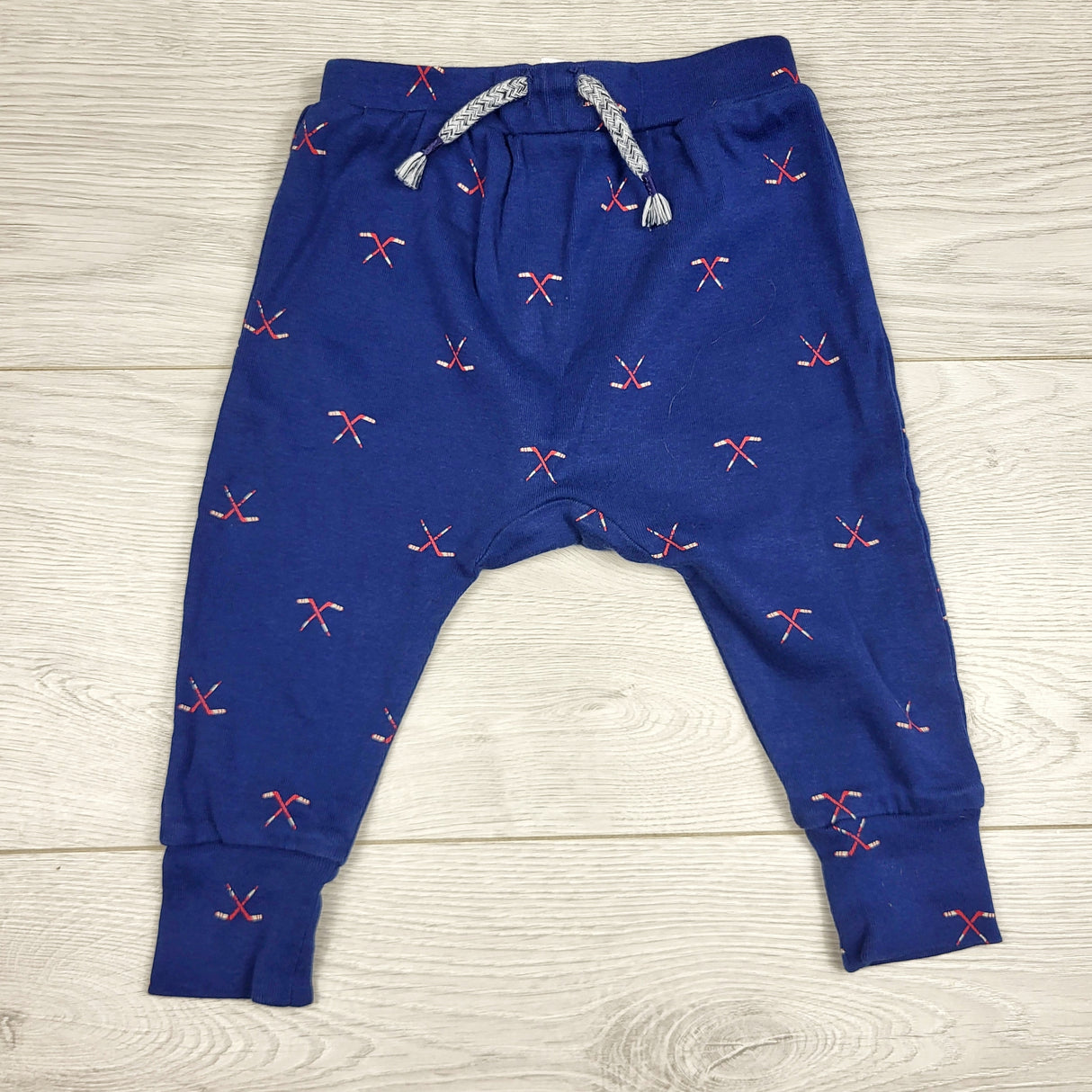 RZA1 - Joe navy cotton pants with hockey sticks. Size 6-12 months