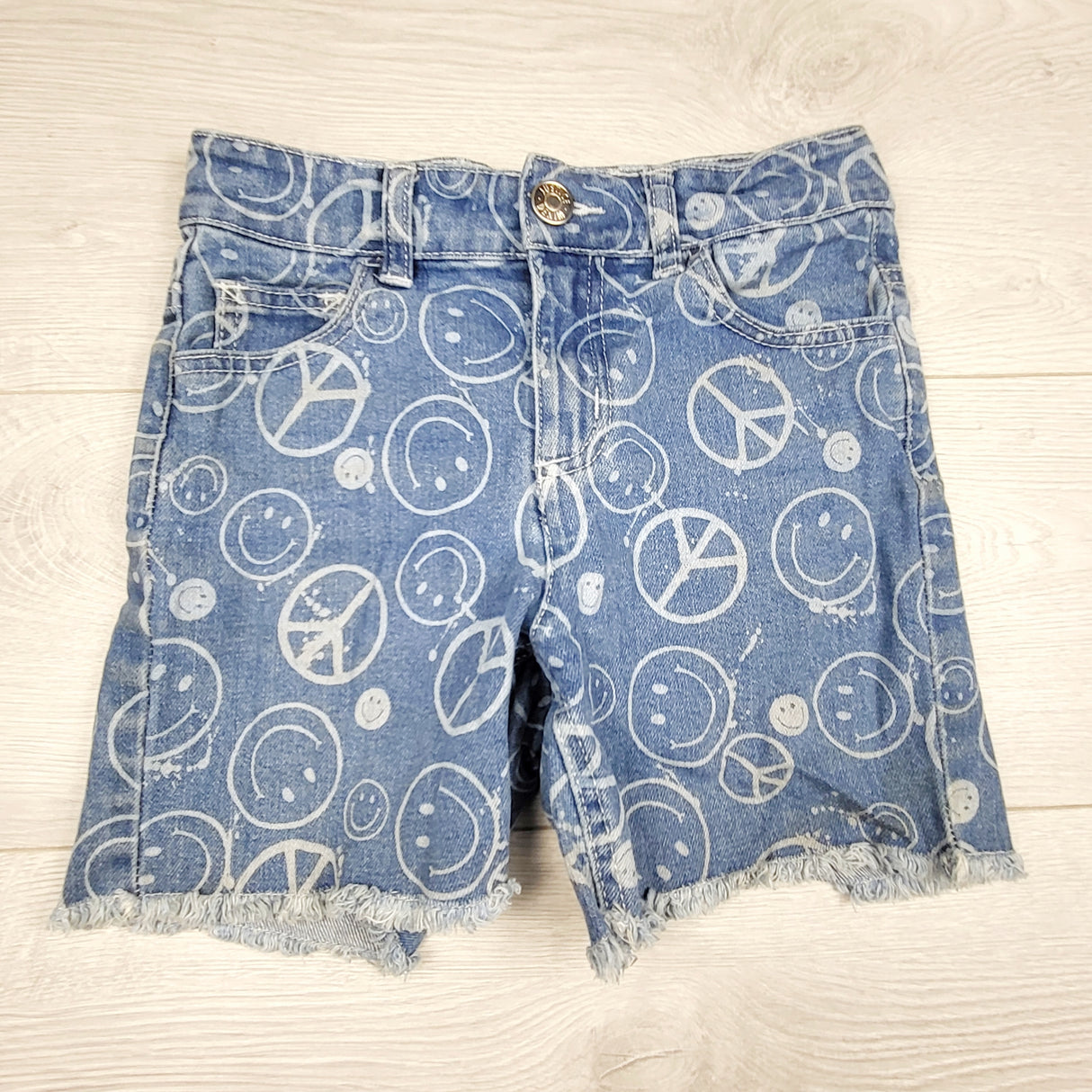 SHDM1 - Justice denim shorts with smiley faces. Size 8