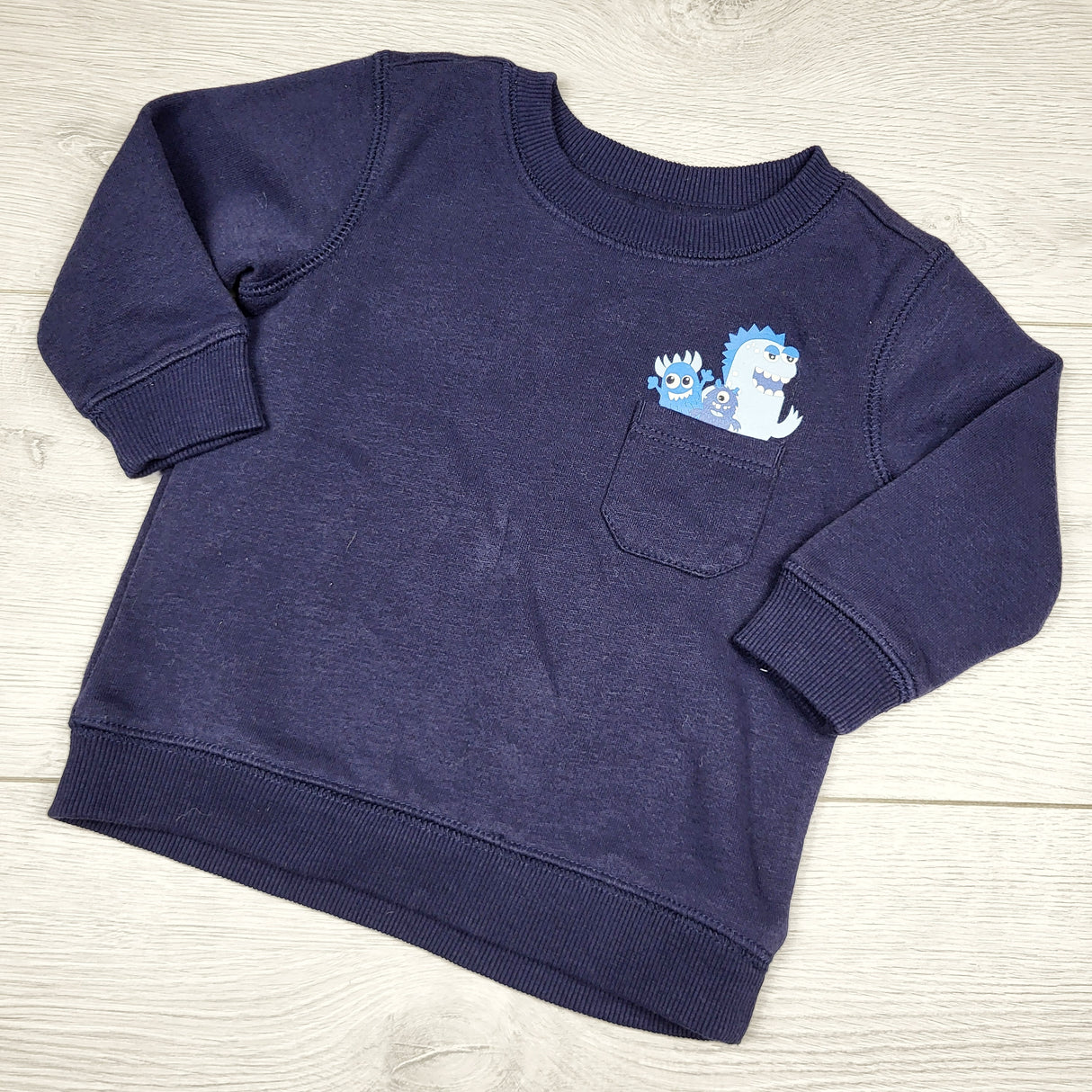 CHFF1 - George navy fleecy lined sweatshirt with dinosaurs. Size 6-12 months