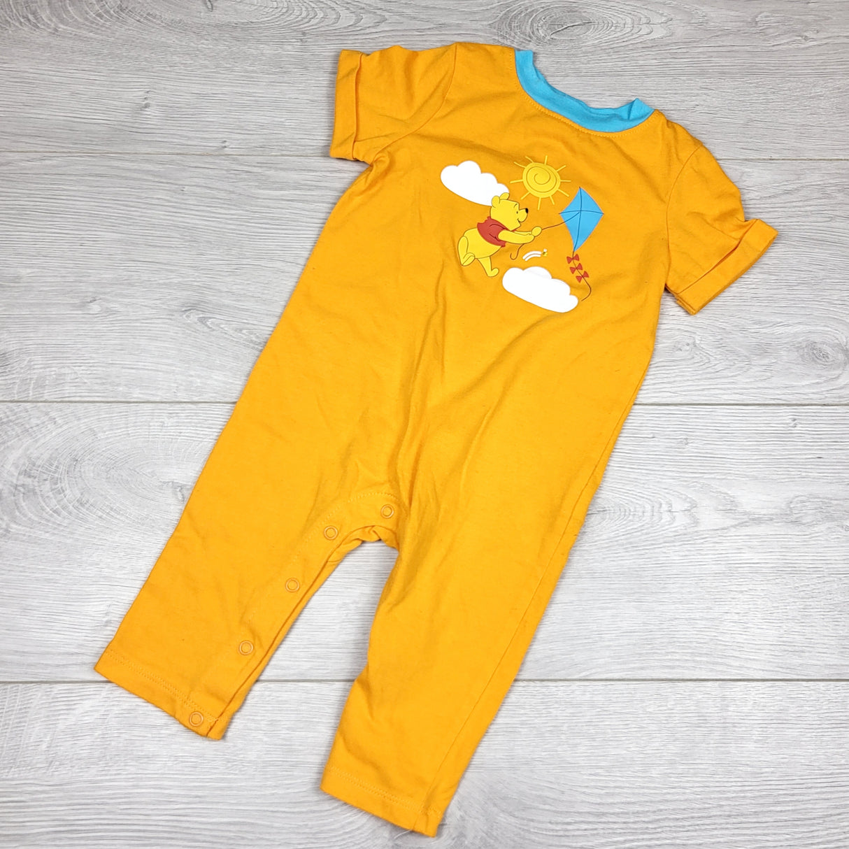 CHFF1 - Joe x Disney orange Winnie the Pooh cotton romper. Size 6-12 months